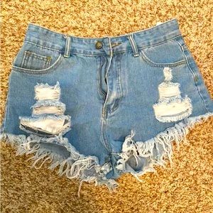 medium light wash blue jean shorts